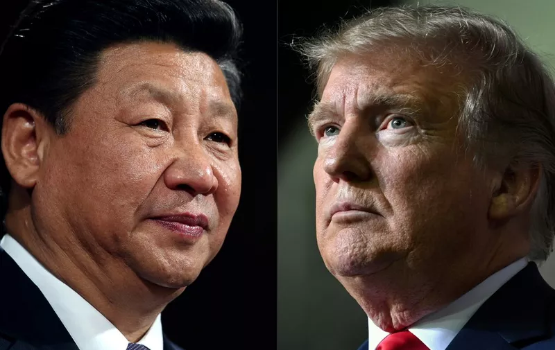 (COMBO) This combination of pictures created on May 14, 2020 shows recent portraits of  
China's President Xi Jinping (L) and US President Donald Trump. - US President Donald Trump said on May 14, 2020, he is no mood to speak with China's Xi Jinping, warning darkly he might cut off ties with the rival superpower over its handling of the coronavirus pandemic. "I have a very good relationship, but I just -- right now I don't want to speak to him," Trump told Fox Business. (Photos by Dan Kitwood and Nicholas Kamm / various sources / AFP)