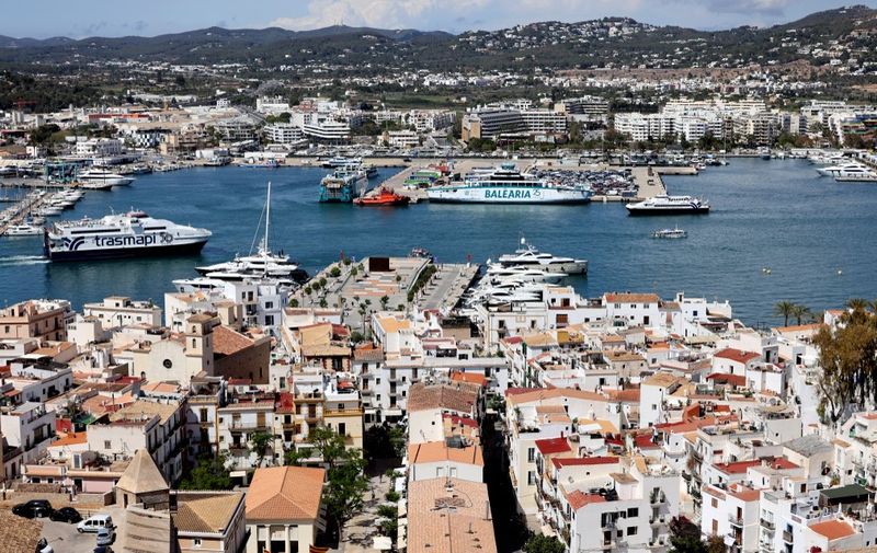 Partial view of the harbour and the Old City of Ibiza, on the  Balearic island of Ibiza, on May 15, 2024. (Photo by Thomas COEX / AFP)