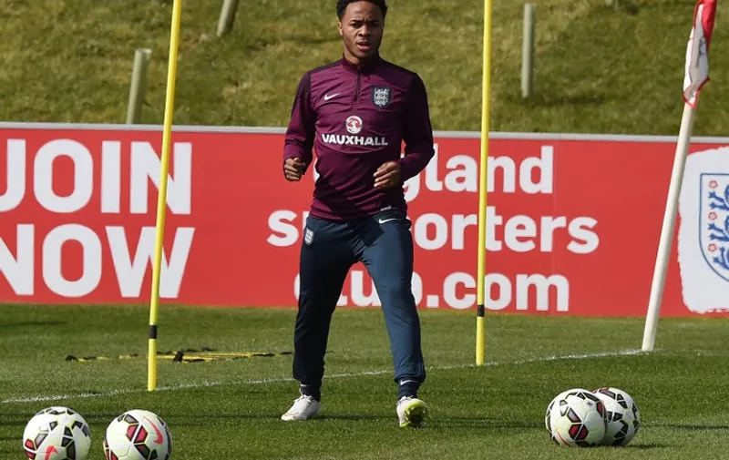 England&#8217;s midfielder Raheem Sterling takes part in a training session at St George&#8217;s Park near Burton-on-Trent, central England, on March 24, 2015, ahead of their UEFA Euro 2016 qualifying football match against Lithuania at Wembley on Friday March 27, 2015. AFP PHOTO/PAUL ELLIS NOT FOR MARKETING OR ADVERTISING USE / RESTRICTED TO EDITORIAL USE