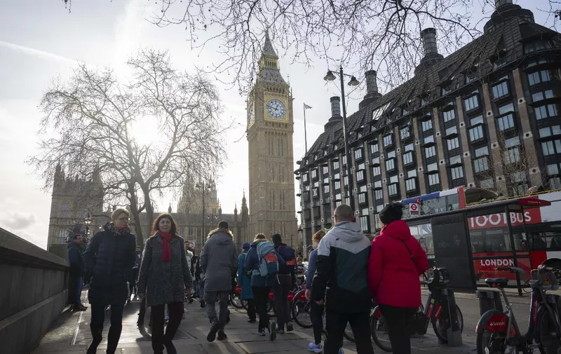 LONDON, UNITED KINGDOM - JANUARY 26: Citizens and tourists enjoy their time in the city center as Big Ben is seen behind while daily life continues in London, United Kingdom on January 26, 2024. After the freezing cold last week, citizens spent time on the streets with the sunny weather this week. Rasid Necati Aslim / Anadolu (Photo by Rasid Necati Aslim / ANADOLU / Anadolu via AFP)