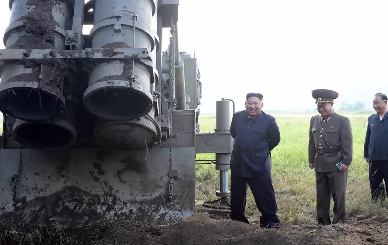 This picture taken on September 10, 2019 and released from North Korea's official Korean Central News Agency (KCNA) on September 11, 2019 shows North Korean leader Kim Jong Un attending the testing of a "super-large multiple rocket launcher" at an undisclosed location in North Korea. - North Korean leader Kim Jong Un has supervised a fresh test of a "super-large multiple rocket launcher" system, state media said on September 11 -- the latest in a series of provocations by Pyongyang. (Photo by KCNA VIA KNS / KCNA VIA KNS / AFP) / - South Korea OUT / REPUBLIC OF KOREA OUT   ---EDITORS NOTE--- RESTRICTED TO EDITORIAL USE - MANDATORY CREDIT "AFP PHOTO/KCNA VIA KNS" - NO MARKETING NO ADVERTISING CAMPAIGNS - DISTRIBUTED AS A SERVICE TO CLIENTS
THIS PICTURE WAS MADE AVAILABLE BY A THIRD PARTY. AFP CAN NOT INDEPENDENTLY VERIFY THE AUTHENTICITY, LOCATION, DATE AND CONTENT OF THIS IMAGE. /