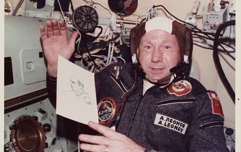 Alexei Arkhipovich Leonov, the Soviet mission Commander on the joint US-USSR Apollo-Soyuz Test Project, holding his drawing of Apollo mission Commander Thomas P Stafford, during the mission, July 1975. (Photo by Space Frontiers/Getty Images)