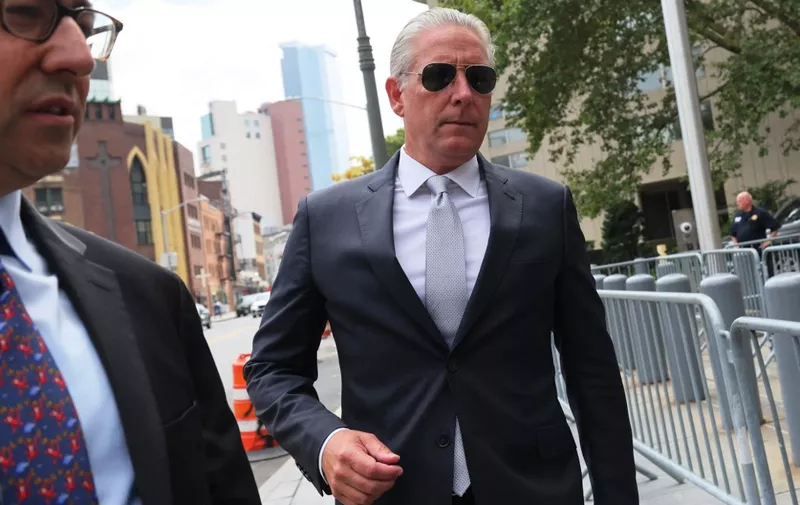 NEW YORK, NEW YORK - AUGUST 15: Former FBI agent Charles McGonigal arrives for a change of plea hearing at Manhattan Federal Court on August 15, 2023 in New York City. McGonigal is expected to change his plea to guilty after initially pleading not guilty. He was arrested on January 21 for allegedly violating and conspiring to violate the International Emergency Economic Powers Act and other charges relating to money laundering. McGonigal is accused of taking payments from Russian oligarch Oleg Deripaska to investigate other Russian oligarchs, and is also charged in a separate case in Washington, D.C. with concealing $225,000 he allegedly received from a former Albanian intelligence employee.   Michael M. Santiago/Getty Images/AFP (Photo by Michael M. Santiago / GETTY IMAGES NORTH AMERICA / Getty Images via AFP)