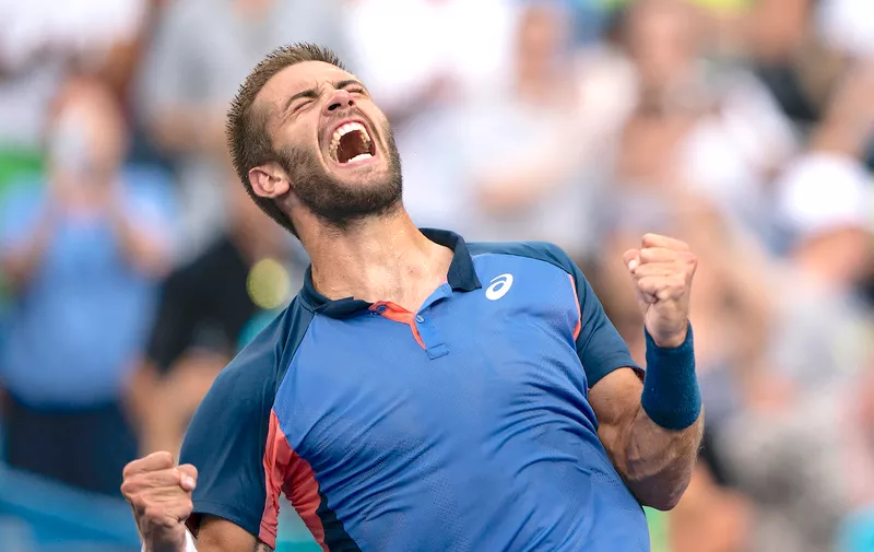 Aug 21, 2022; Cincinnati, OH, USA; Borna Coric (CRO) celebrates winning the men’s final match against Stefanos Tsitsipas (GRE) at the Western &amp; Southern Open at the Lindner Family Tennis Center. Mandatory Credit: Susan Mullane-USA TODAY Sports