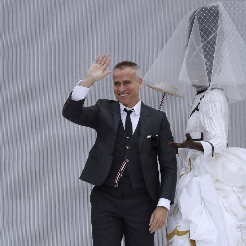 US designer Thom Browne acknowledges the audience after the Thom Browne Women's Spring-Summer 2020 Ready-to-Wear collection fashion show at the Ecole nationale superieure des Beaux-Arts in Paris, on September 29, 2019. (Photo by FRANCOIS GUILLOT / AFP)