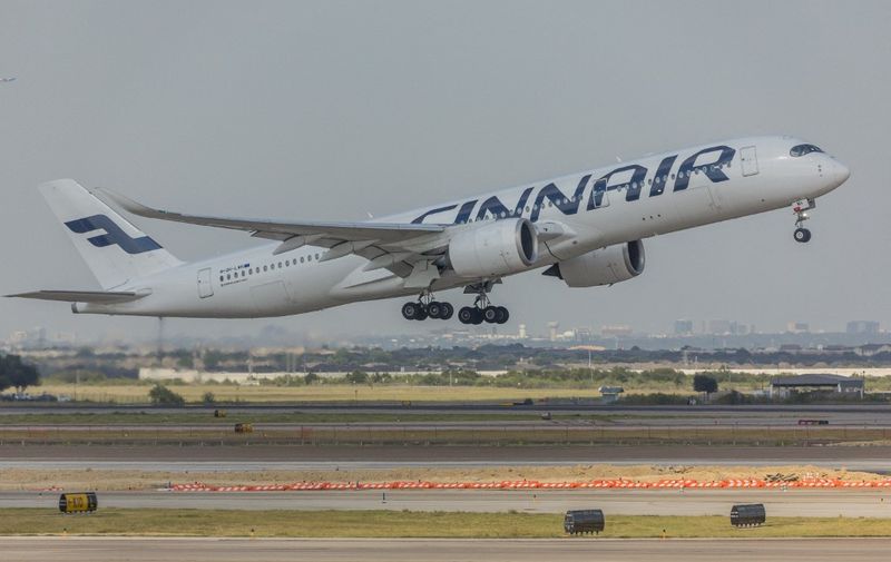 Finnair plane is seen at the Dallas-Fort Worth International Airport (DFW) in Dallas Texas in the United States on August 1, 2023. (Photo by William Volcov / BRAZIL PHOTO PRESS / Brazil Photo Press via AFP)
