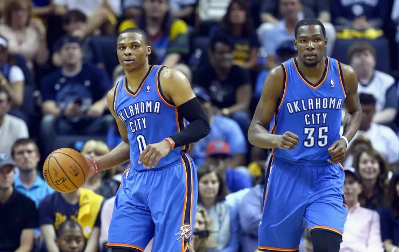 MEMPHIS, TN - APRIL 26: Russell Westbrook #0 of the Oklahoma City Thunder and Kevin Durant #35 come up the floor together during the game against the Memphis Grizzlies in Game 4 of the Western Conference Quarterfinals during the 2014 NBA Playoffs at FedExForum on April 26, 2014 in Memphis, Tennessee. NOTE TO USER: User expressly acknowledges and agrees that, by downloading and or using this photograph, User is consenting to the terms and conditions of the Getty Images License Agreement.   Andy Lyons/Getty Images/AFP