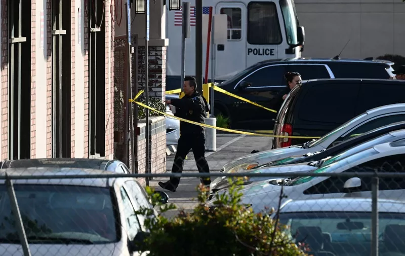 Investigators work at the scene of a mass shooting in Monterey Park, California, on January 22, 2023. Ten people have died and at least 10 others have been wounded in a mass shooting in a largely Asian city in southern California, police said, with the suspect still at large hours later. (Photo by Robyn BECK / AFP)