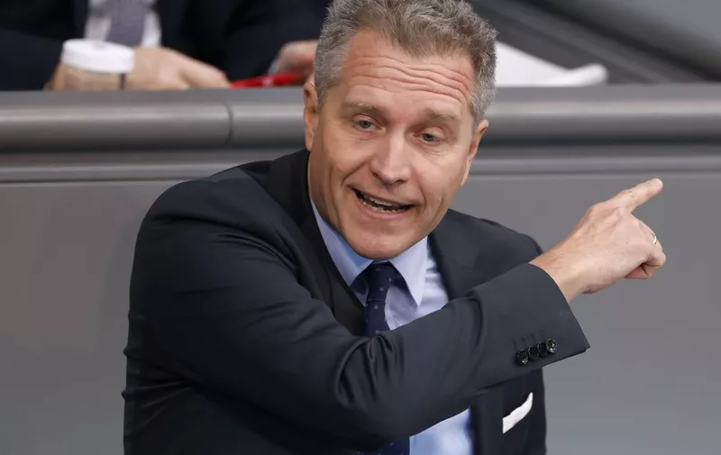 (FILES) German MP Petr Bystron of the right-wing Alternative for Germany (AfD) addresses a session of the Bundestag, Germany's lower house of parliament, on the delivery of battle tanks to Ukraine, in Berlin on January 19, 2023. Petr Bystron denied on April 3, 2024 that he was paid to spread pro-Russian positions on a Moscow-financed news website. "I have not accepted any money to advocate pro-Russian positions," Petr Bystron, a lawmaker and the Alternative for Germany's (AfD) number two candidate for the European elections, told the Funke media group. (Photo by Odd ANDERSEN / AFP)