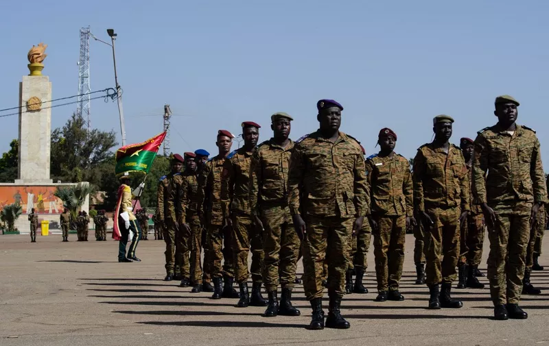 Soldiers from different army corps to be decorated with medals arrive during the 62nd anniversary of the creation of the Burkina Faso Armed Forces at the Nation Square in Ouagadougou on November 1, 2022. (Photo by Martin Demay / AFP)