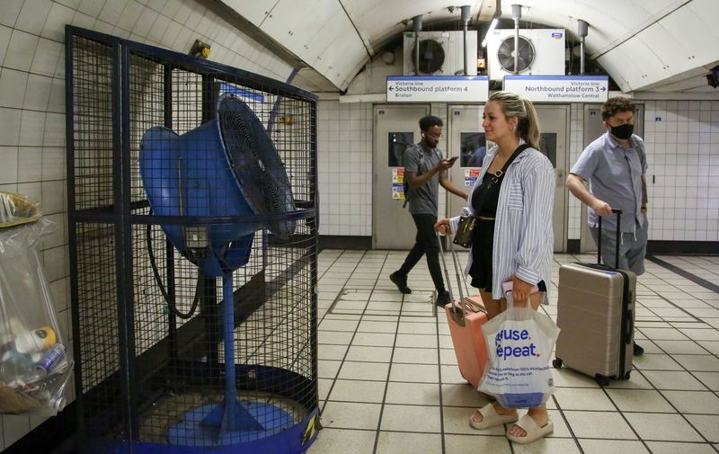 A woman cools off in front of a large fan in Kings Cross tube station during the heatwave. The Met Office has issued red extreme heat warning for parts of England for today and tomorrow as the temperatures could hit 40 degrees celsius.
Heatwave continues, London, UK - 18 Jul 2022,Image: 707998426, License: Rights-managed, Restrictions: , Model Release: no, Credit line: Profimedia