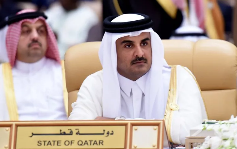 Qatar's Emir Sheikh Tamim bin Hamad al-Thani attends the 4th Summit of Arab States and South American countries in the Saudi capital Riyadh, on November 11, 2015. The summit aims to strengthen ties between the geographically distant but economically powerful regions.  AFP PHOTO / FAYEZ NURELDINE / AFP / FAYEZ NURELDINE