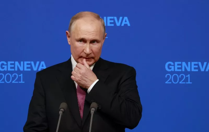 Russia's President Vladimir Putin holds a press conference after meeting with US President in Geneva on June 16, 2021. (Photo by DENIS BALIBOUSE / POOL / AFP)