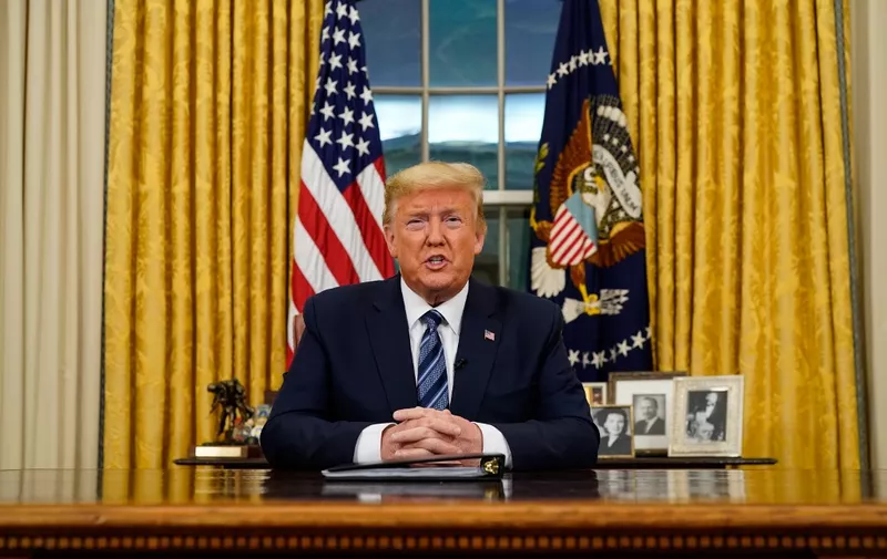 WASHINGTON, DC - MARCH 11: US President Donald Trump addresses the nation from the Oval Office about the widening Coronavirus crisis on March 11, 2020 in Washington, DC. President Trump said the US will suspend all travel from Europe - except the UK - for the next 30 days. Since December 2019, Coronavirus (COVID-19) has infected more than 109,000 people and killed more than 3,800 people in 105 countries.   Doug Mills-Pool/Getty Images/AFP