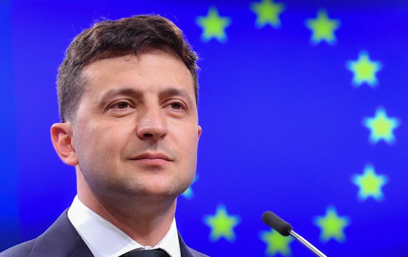 Ukraine's President Volodymyr Zelensky looks on during a press conference after a meeting with president of the European Council at the European Council in Brussels on June 5, 2019. (Photo by EMMANUEL DUNAND / AFP)