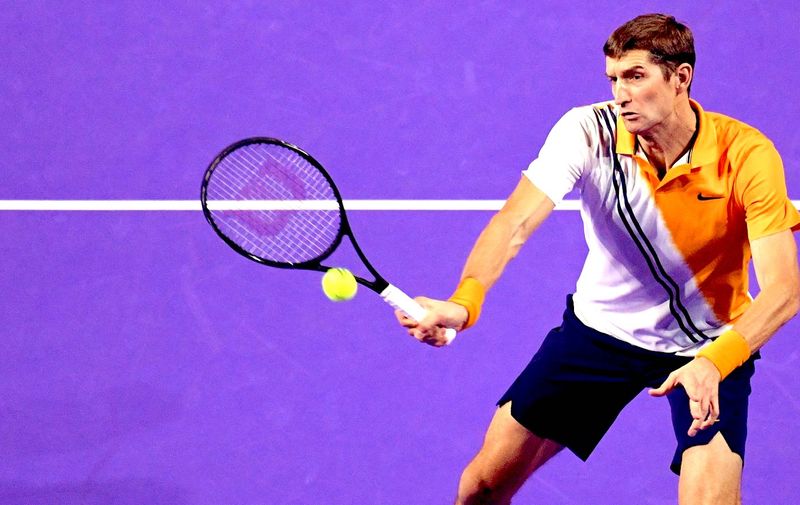 5673427 21.10.2018 Max Mirnyi, of Belarus, returns a ball during the Kremlin Cup men&#8217;s doubles final tennis match against Rajeev Ram and Austin Krajicek, of USA, in Moscow, Russia, October 21, 2018., Image: 391994251, License: Rights-managed, Restrictions: , Model Release: no, Credit line: Profimedia, Sputnik