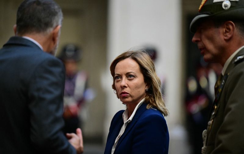 Italy's Prime Minister, Giorgia Meloni waits for the arrival of Hungary's Prime Minister Viktor Orban at Palazzo Chigi prior their meeting in Rome on June 24, 2024. (Photo by Tiziana FABI / AFP)