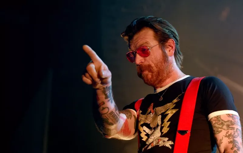 Singer Jesse Hughes of US rock group Eagles of Death Metal performs on stage during a concert in Vienna on February 22, 2016.
The Californian rock group Eagles of Death Metal played at the Bataclan music hall in Paris when jihadist gunmen burst in and killed 90 people in November 2015. / AFP PHOTO / APA / HERBERT P. OCZERET / Austria OUT