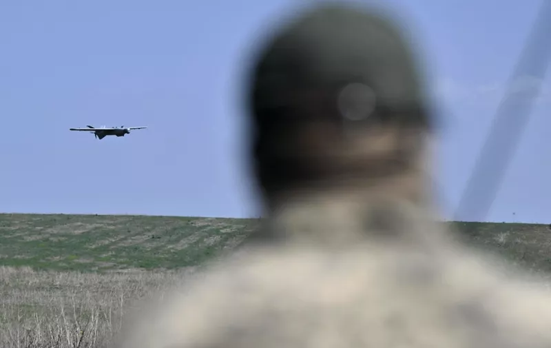 A Ukrainian serviceman of the 22nd Brigade controls a Leleka reconnaissance UAV drone near Chasiv Yar, Donetsk region, on April 27, 2024, amid the Russian invasion of Ukraine. (Photo by Genya SAVILOV / AFP)