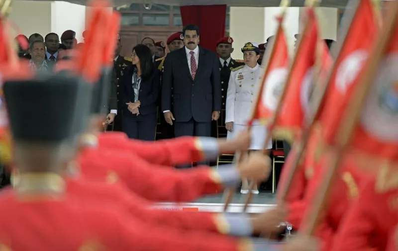 Venezuelan President Nicolas Maduro (C) attends a military promotion ceremony in Caracas on July 1, 2014. AFP PHOTO/Leo RAMIREZ / AFP PHOTO / LEO RAMIREZ