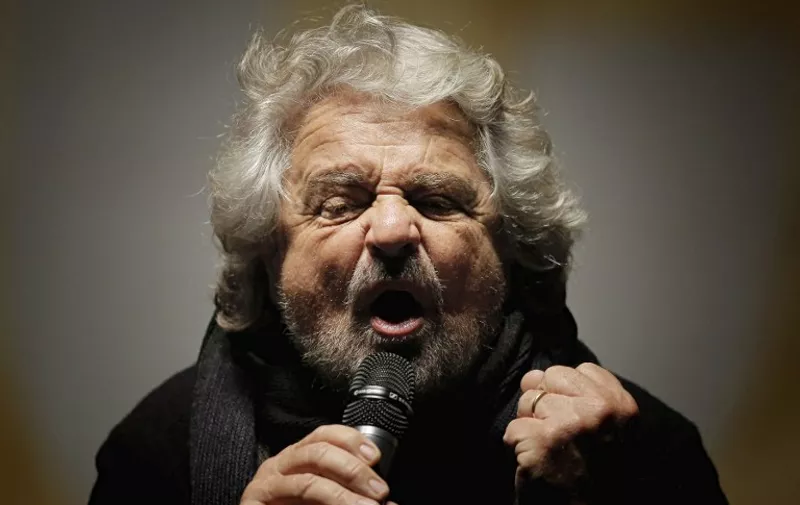 The leader of the Five Star Movement, Beppe Grillo, delivers a speech during a campaign meeting  upon a referendum on constitutional reforms, on December 2, 2016 in Piazza San Carlo in Turin. Beppe Grillo, leader of the populist Five Star Movement calls his supporters to vote NO at the referendum on constitution which be held on December 4, 2016. / AFP PHOTO / MARCO BERTORELLO