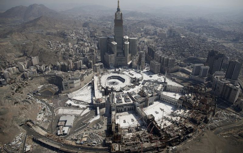 An aerial view shows the Clock Tower and the Grand Mosque in Saudi Arabia's holy Muslim city of Mecca on September 13, 2016.
More than 1.8 million faithful from around the world have been attending the annual pilgrimage which officially ends on September 15.
 / AFP PHOTO / AHMAD GHARABLI