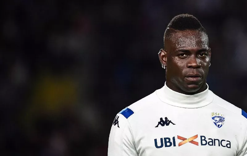 (FILES) In this file photo taken on September 24, 2019 Brescia's Italian forward Mario Balotelli looks on during the Italian Serie A football match Brescia vs Juventus at the Mario-Rigamonti stadium in Brescia. - Mario Balotelli on November 3, 2019 thanked his fellow players and supporters for their support after he was racially abused by Hellas Verona fans, the latest in a series of ugly incidents that have blighted the early weeks of the Serie A season. (Photo by Marco Bertorello / AFP)