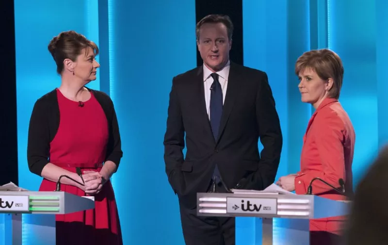 In a handout picture released by ITV on April 2, 2015, (L-R) Leader of Plaid Cymru, Leanne Wood, British Prime Minister and Conservative Party leader, David Cameron and Leader of the Scottish National Party (SNP), Nicola Sturgeon chat ahead of the "ITV Leaders' Debate" at ITV studios in Salford, north west England on April 2, 2015. The two-hour debate sees Cameron and Miliband share a panel with the leaders of the Liberal Democrats -- who share power in the coalition government -- the UK Independence Party (UKIP), the Greens and the Scottish and Welsh nationalists. AFP PHOTO / ITV / KEN MCKAY

RESTRICTED TO EDITORIAL USE - MANDATORY CREDIT  " AFP PHOTO / ITV / KEN MCKAY "  -  NO MARKETING NO ADVERTISING CAMPAIGNS   -  TO BE USED UNTIL 0001 MAY 14, 2015 - NOT TO BE ARCHIVED OR USED AFTER 0001 MAY 14, 2015