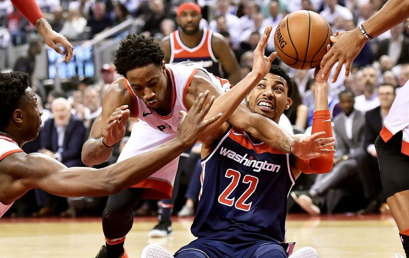 Toronto Raptors guard DeMar DeRozan (10) vies for control of the ball with Washington Wizards forward Otto Porter Jr. (22) and Toronto Raptors forward OG Anunoby (3) during first half Washington Wizards v Toronto Raptors, NBA playoff basketball game, Toronto, Canada &#8211; 17 Apr 2018, Image: 368810347, License: Rights-managed, Restrictions: , Model Release: no, Credit [&hellip;]