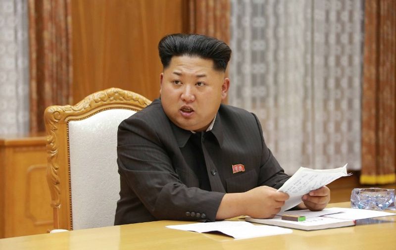 This picture taken by North Korea's official Korean Central News Agency (KCNA) on August 20, 2015 shows North Korean leader Kim Jong-Un attending an emergency enlarged meeting of the Workers' Party of Korea (WPK) Central Military Commission at undisclosed place in North Korea. Kim Jong-Un ordered his frontline troops onto a war-footing from on August 21, as military tensions with South Korea soared following a rare exchange of artillery shells across their heavily fortified border.     AFP PHOTO / KCNA via KNS    REPUBLIC OF KOREA OUT
THIS PICTURE WAS MADE AVAILABLE BY A THIRD PARTY. AFP CAN NOT INDEPENDENTLY VERIFY THE AUTHENTICITY, LOCATION, DATE AND CONTENT OF THIS IMAGE. THIS PHOTO IS DISTRIBUTED EXACTLY AS RECEIVED BY AFP.
---EDITORS NOTE--- RESTRICTED TO EDITORIAL USE - MANDATORY CREDIT "AFP PHOTO / KCNA VIA KNS" - NO MARKETING NO ADVERTISING CAMPAIGNS - DISTRIBUTED AS A SERVICE TO CLIENTS