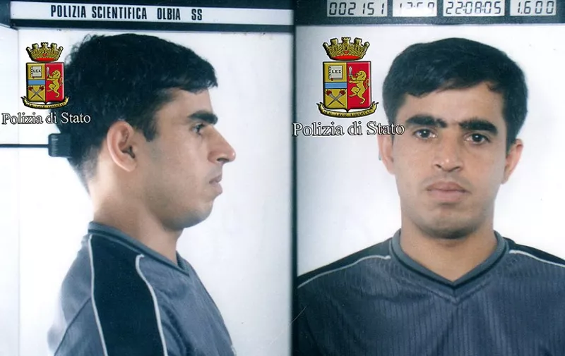 A handout photo released by the Italian Police shows Siyar Khan of Pakistan who is detained in Rome, police said on June 26, 2015. Khan is accused of organising a 2009 bomb attack on a Peshawar market that killed more than 130 people. In a statement, police said they suspected he had an "executive role" in what was one of the worst attacks in Pakistan's history - the October 28, 2009 bombing of the crowded Meena Bazaar which left 134 dead, including scores of women and children, and more than 200 others injured.    AFP PHOTO / POLIZIA DI STATO

= RESTRICTED TO EDITORIAL USE - MANDATORY CREDIT "AFP PHOTO / HO / POLIZIA DI STATO" - NO MARKETING NO ADVERTISING CAMPAIGNS - DISTRIBUTED AS A SERVICE TO CLIENTS =