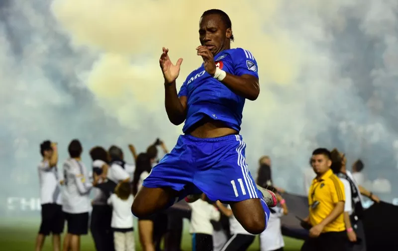 Didier Drogba of the Montreal Impact warms up prior to kickoff against the LA Galaxy in their MLS match on September 12, 2015 in Carson, California which ended 0-0. AFP PHOTO /FREDERIC J.BROWN