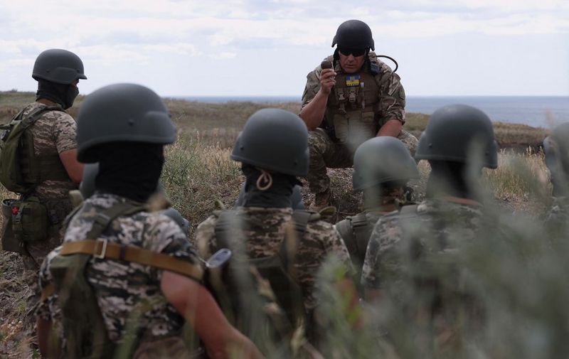 Servicemen of the 126th Separate Territorial Brigade of the Armed Forces of Ukraine take part in military exercises in Odessa region on June 22, 2022, amid Russia's military invasion launched on Ukraine. (Photo by Oleksandr GIMANOV / AFP)