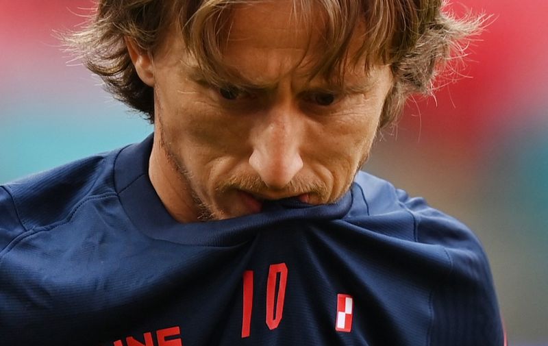 Croatia's midfielder Luka Modric gestures during their MD-1 training session at Wembley Stadium in London on June 12, 2021, the eve of their UEFA EURO 2020 Group D football match against England. (Photo by Glyn KIRK / AFP)