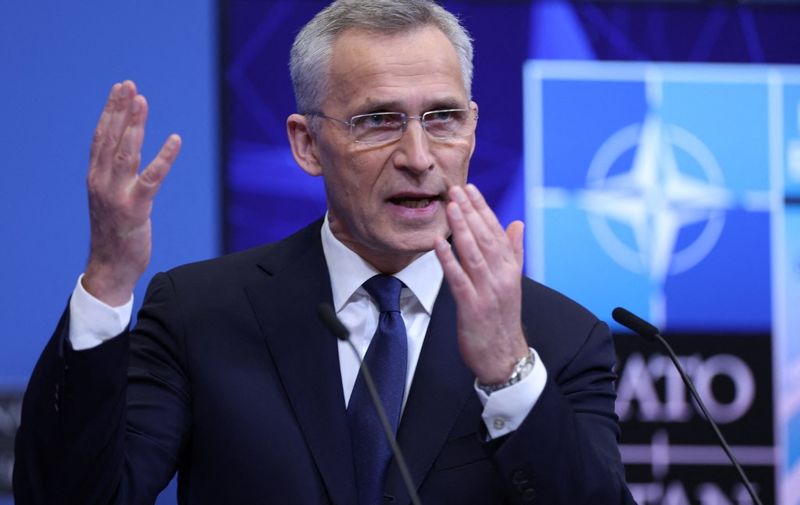 NATO Secretary General Jens Stoltenberg addresses a press conference at NATO Headquarters in Brussels on March 24, 2022. (Photo by Kenzo TRIBOUILLARD / AFP)