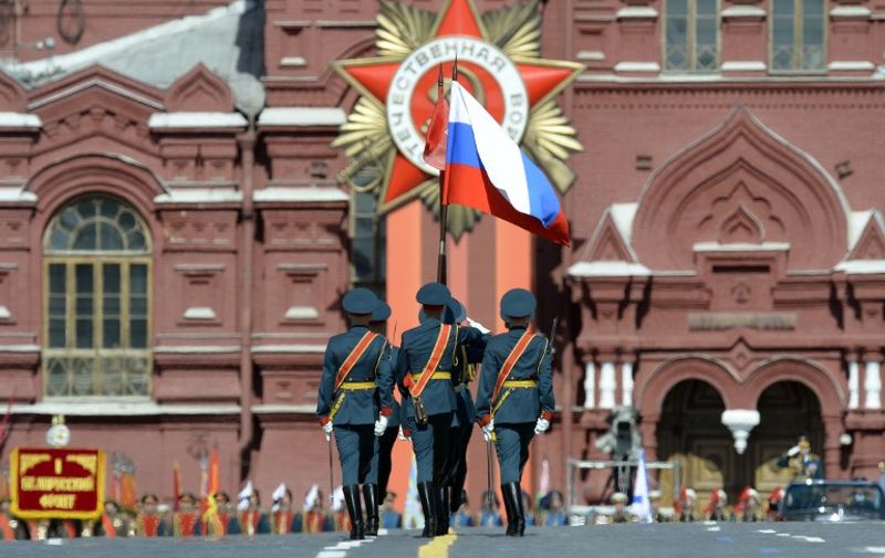 Russian honour guard soldiers march through Red Square during the Victory Day military parade in Moscow on May 9, 2015. Russian President Vladimir Putin presides over a huge Victory Day parade celebrating the 70th anniversary of the Soviet win over Nazi Germany, amid a Western boycott of the festivities over the Ukraine crisis. AFP PHOTO / YURI KADOBNOV / AFP PHOTO / YURI KADOBNOV
