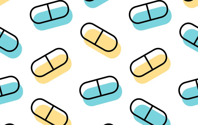 Seamless pattern with drugs pills and capsules. Vector illustration