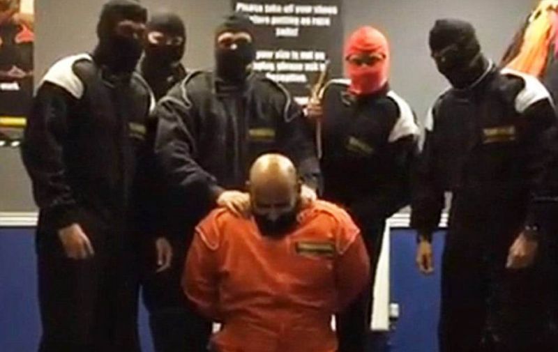 SIX bankers were sacked yesterday for pretending to behead an Asian workmate in a mock IS execution - while yelling "Allahu Akbar". The HSBC workers filmed the sick stunt while on a team-building exercise then posted it online. Credit: The Sun Link back: http://www.thesun.co.uk/sol/homepage/news/6531927/Bank-workers-stage-mock-IS-style-execution-of-Asian-co-worker.html