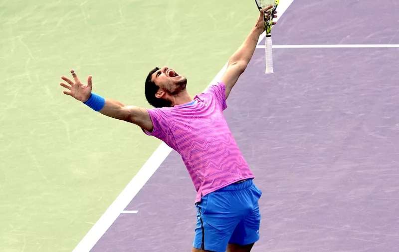 Carlos Alcaraz, of Spain, celebrates after defeating Daniil Medvedev, of Russia, in the final match at the BNP Paribas Open tennis tournament, Sunday, March 17, 2024, in Indian Wells, Calif. (AP Photo/Mark J. Terrill)