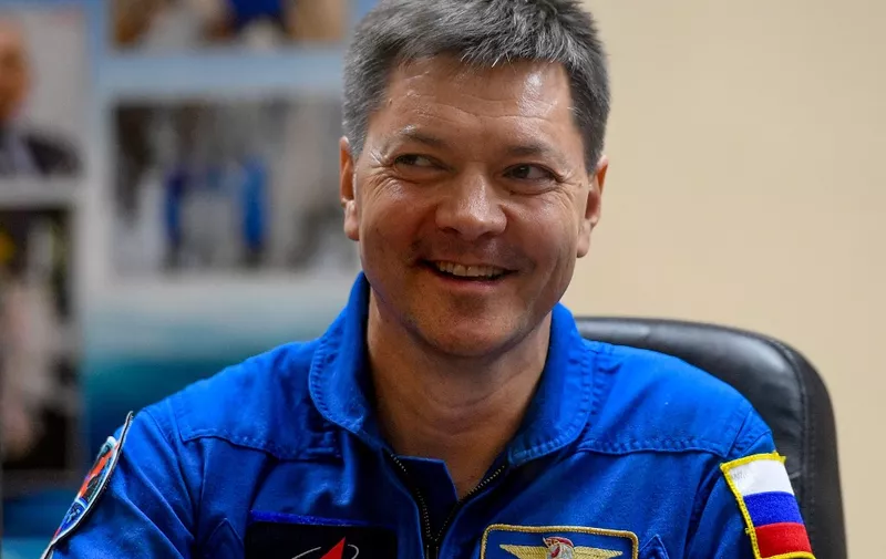 Member of the International Space Station (ISS) expedition 58/59 NASA, Russian cosmonaut Oleg Kononenko smiles during a press conference at the Russian-leased Baikonur cosmodrome in Kazakhstan on December 2, 2018. The launch of the Soyuz MS-11 spacecraft with members of the International Space Station (ISS) expedition 58/59 is scheduled on December 3, 2018 from the Russian-leased Kazakh Baikonur cosmodrome. (Photo by Kirill KUDRYAVTSEV / AFP)