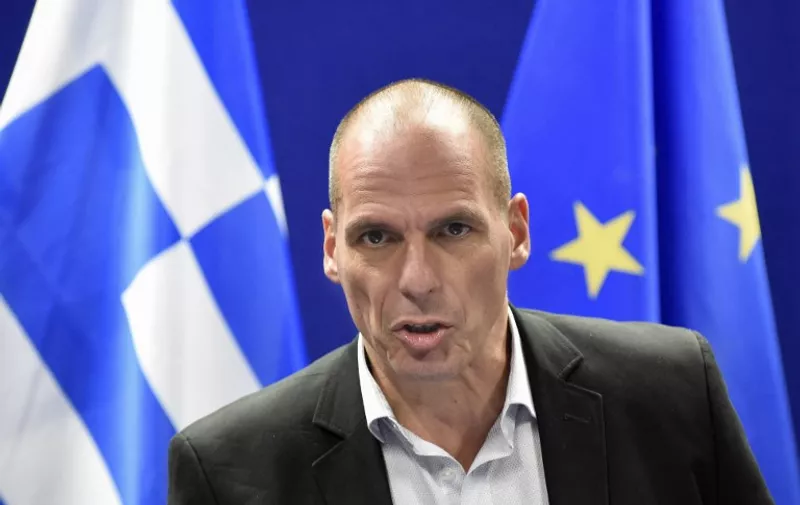 Greek Finance Minister Yanis Varoufakis speaks during a press conference after a Eurogroup Council meeting on May 11, 2015 at the EU Headquarters in Brussels. AFP PHOTO/JOHN THYS