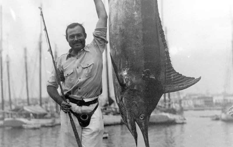 EH 1306N    July 1934
Ernest Hemingway with marlin. Havana Harbor, Cuba. Photograph in the Ernest Hemingway Photograph Collection, John Fitzgerald Kennedy Library, Boston.