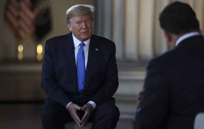 WASHINGTON, DC - MAY 03: President Donald Trump speaks with news anchor Bret Baier during a Virtual Town Hall inside of the Lincoln Memorial on May 3, 2020 in Washington, DC.   Oliver Contreras-Pool/Getty Images/AFP