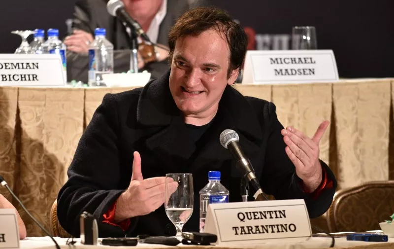 NEW YORK, NY - DECEMBER 14: Director Quentin Tarantino speaks at the press conference for THE HATEFUL EIGHT at Waldorf Astoria Hotel on December 14, 2015 in New York City.   Bryan Bedder/Getty Images for The Weinstein Company/AFP