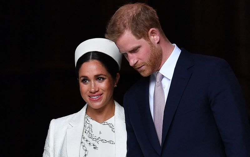 (FILES) In this file photo taken on March 11, 2019 Britain's Prince Harry, Duke of Sussex (R) and Meghan, Duchess of Sussex leave after attending a Commonwealth Day Service at Westminster Abbey in central London, on March 11, 2019. - Queen Elizabeth II will host a showdown meeting with Prince Harry on January 13, 2020 in an attempt to solve the crisis triggered by his bombshell announcement that he and wife Meghan were stepping back from the royal frontline. (Photo by Ben STANSALL / AFP)