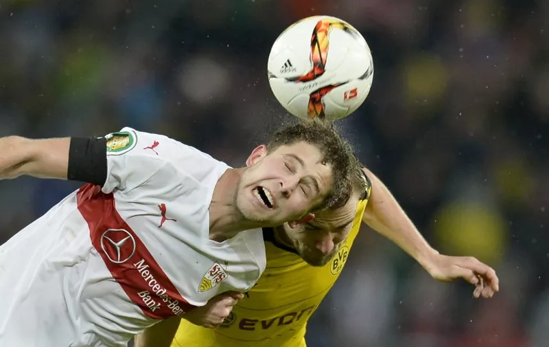 Stuttgart's Ukrainian forward Artem Kravets (L) and Dortmund's defender Marcel Schmelzer vie for the ball during the German Cup ( Pokal ) quarter final football match VfB Stuttgart v Borussia Dortmund on February 9, 2016 in Stuttgart. / AFP / Thomas Kienzle / RESTRICTIONS: ACCORDING TO DFB RULES IMAGE SEQUENCES TO SIMULATE VIDEO IS NOT ALLOWED DURING MATCH TIME. MOBILE (MMS) USE IS NOT ALLOWED DURING AND FOR FURTHER TWO HOURS AFTER THE MATCH.
== RESTRICTED TO EDITORIAL USE == 
FOR MORE INFORMATION CONTACT DFB DIRECTLY AT +49 69 67880
 /