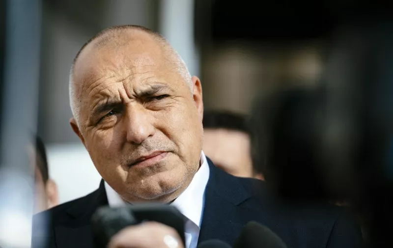 Head of the centre-right GERB party and former prime minister Boyko Borisov speaks to journalists at a polling station in Sofia on March 26, 2017, during the country's parliamentary election.
Bulgaria's election is expected to be a tight race between the Socialists, seen as closer to Russia, and the centre-right. The nationalist United Patriots are tipped to come third. / AFP PHOTO / Dimitar DILKOFF