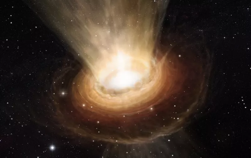 This image released by the European Southern Observatory (ESO) on June 19,2013 of an artists impression shows the surroundings of the supermassive black hole at the heart of the active galaxy NGC 3783 in the southern constellation of Centaurus (The Centaur). New observations using the Very Large Telescope Interferometer at ESOs Paranal Observatory in Chile have revealed not only the torus of hot dust around the black hole but also a wind of cool material in the polar regions.
RESTRICTED TO EDITORIAL USE - MANDATORY CREDIT "AFP PHOTO / EUROPEAN SOUTHERN OBSERVATORY - M. KORNMESSER" - NO MARKETING NO ADVERTISING CAMPAIGNS - DISTRIBUTED AS A SERVICE TO CLIENTS