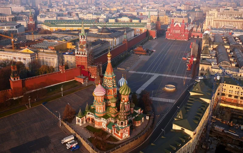 Aerial view of St. Basil's Cathedral, with the parade grounds of Red Square (R), and the Kremlin (L)
Aerial views taken using a drone of Moscow, Russia - Nov 2014
*Full story: http://www.rexfeatures.com/nanolink/pux7 
If there's one group you don't want to get on the wrong side of it's the police in Russia, but that's exactly what one photographer risked to get this stunning aerial shot of the Kremlin. New Zealand photographer Amos Chapple and his trusty drone had been commissioned to take various aerial photos of Moscow for a publishing company. Soon he had a series of breathtaking shots showing the beautiful city and its awe-inspiring architecture but one shot he particularly wanted, but knew would be extremely difficult to get, was of Red Square and its surroundings buildings, including the Kremlin. Amos comments: "The area around the Kremlin is crawling with police and undercover FSB agents who walk around with beanies and tracksuits and introduce themselves as "KGB" if they don't like what you're doing. "I desperately wanted to attempt the picture so over the course of two days I scoped out the area and eventually settled on a spot".,Image: 235649045, License: Rights-managed, Restrictions: , Model Release: no, Credit line: Profimedia