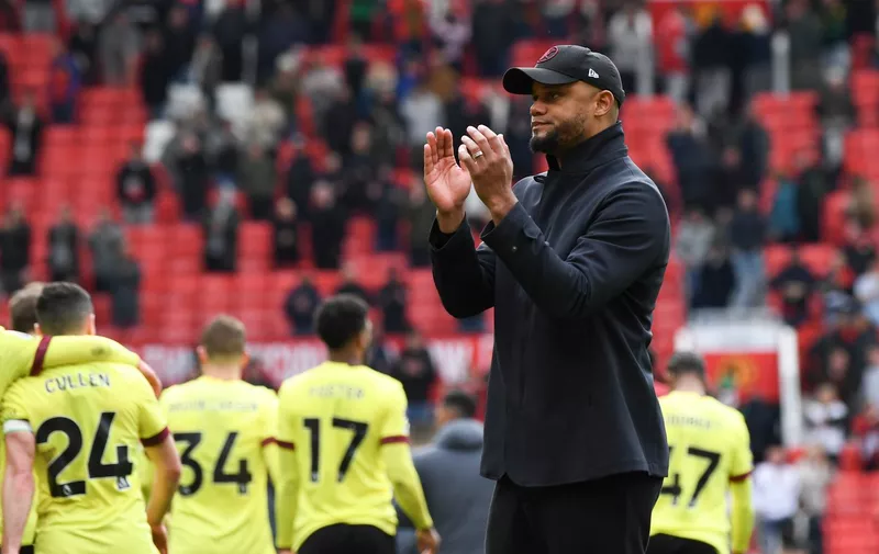 Burnley's head coach Vincent Kompany applauds fans after the English Premier League soccer match between Manchester United and Burnley at Old Trafford stadium in Manchester, England, Saturday, April 27, 2024. (AP Photo/Rui Vieira)